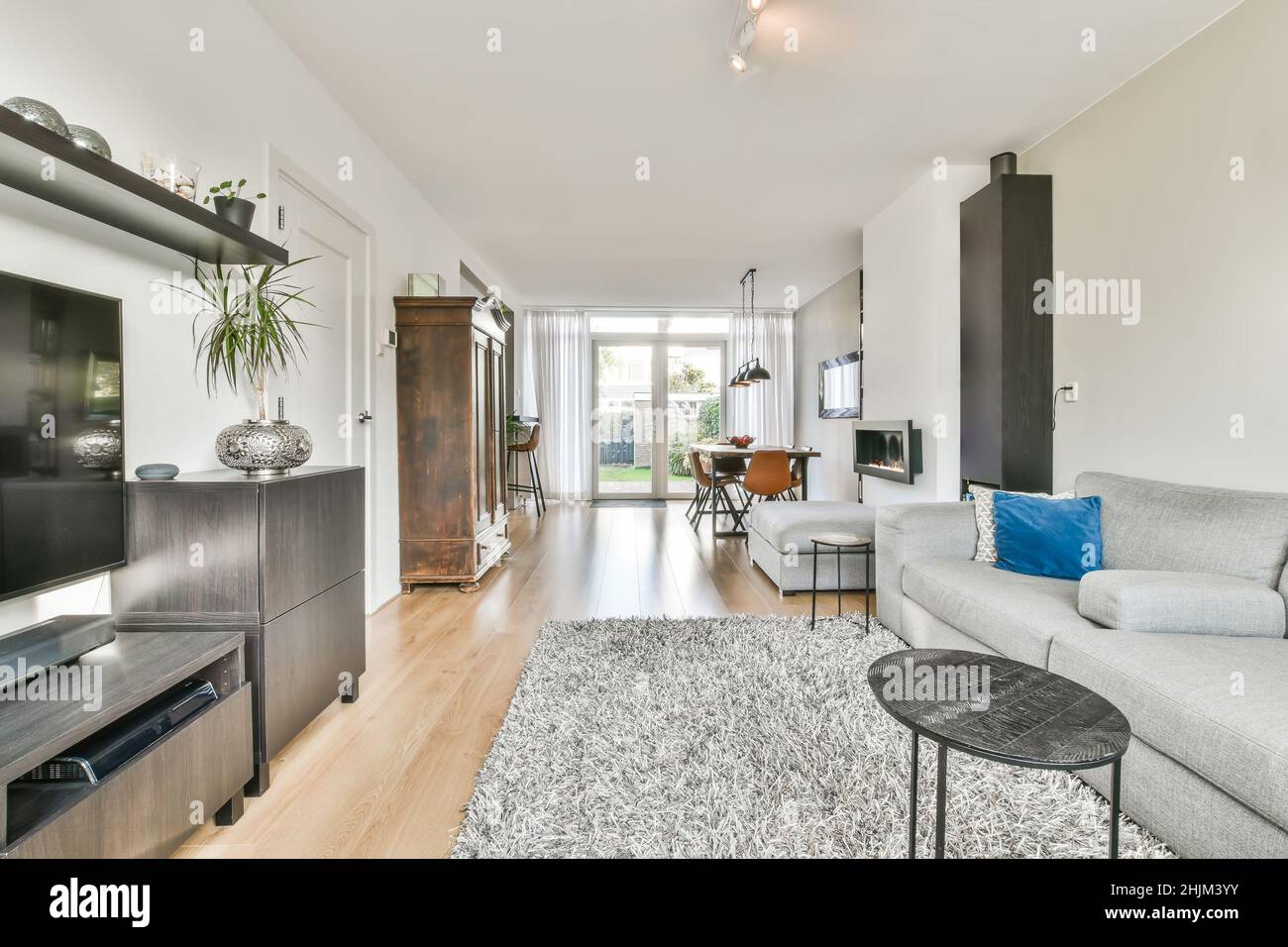Beautiful living room interior with hardwood floors Stock Photo - Alamy