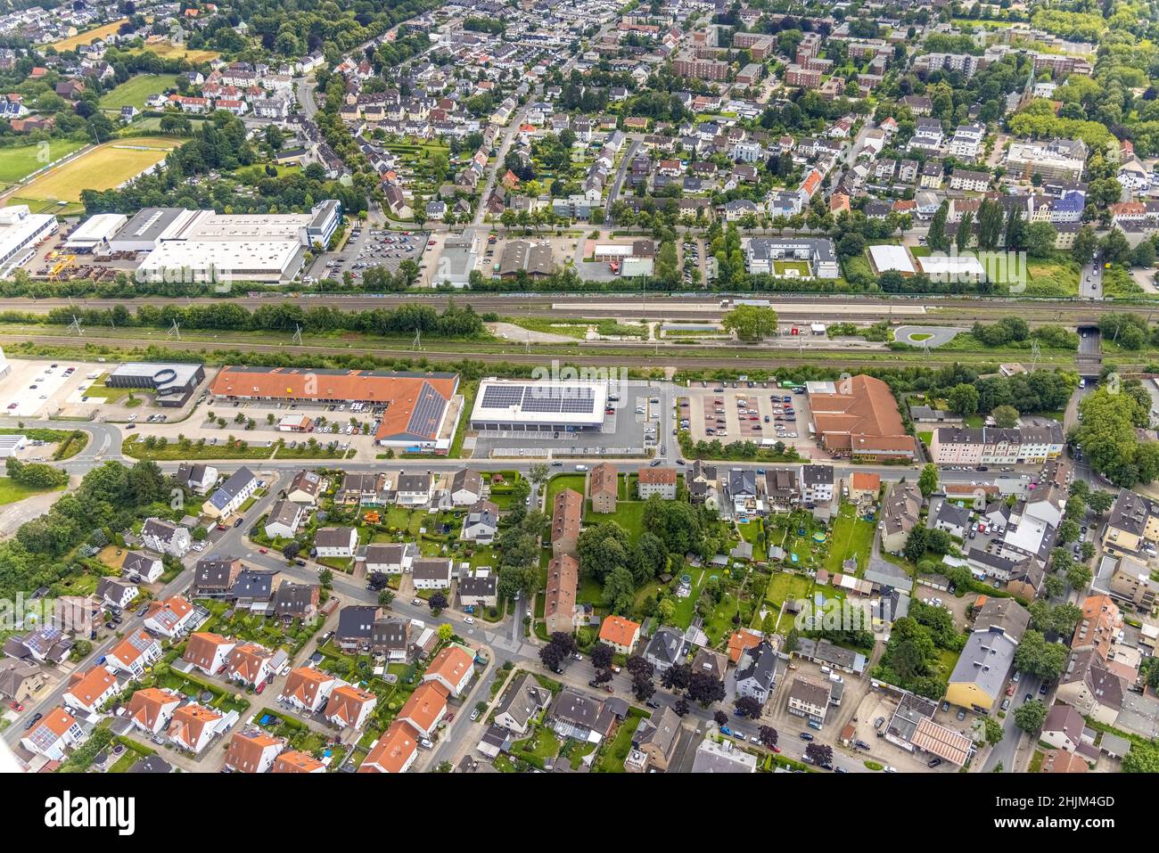 Aerial photograph, Holzwickede railway station, local supply centre, new Aldi SuperMarkt, Freiberg, Holzwickede, Ruhr area, North Rhine-Westphalia, Ge Stock Photo