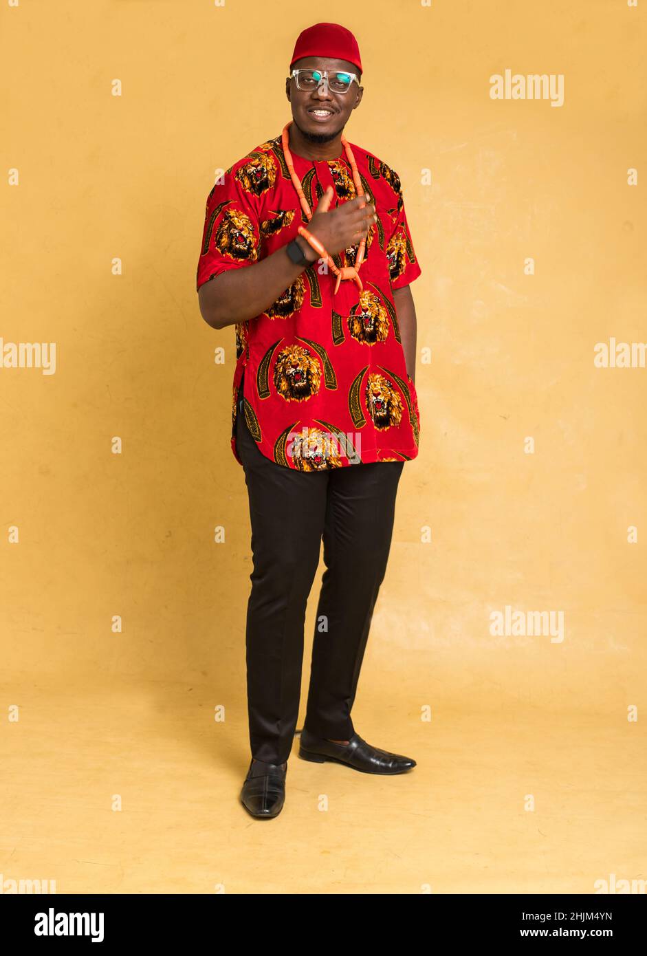 Igbo Traditionally Dressed Business Man Standing and Adjust Beads Stock Photo Alamy