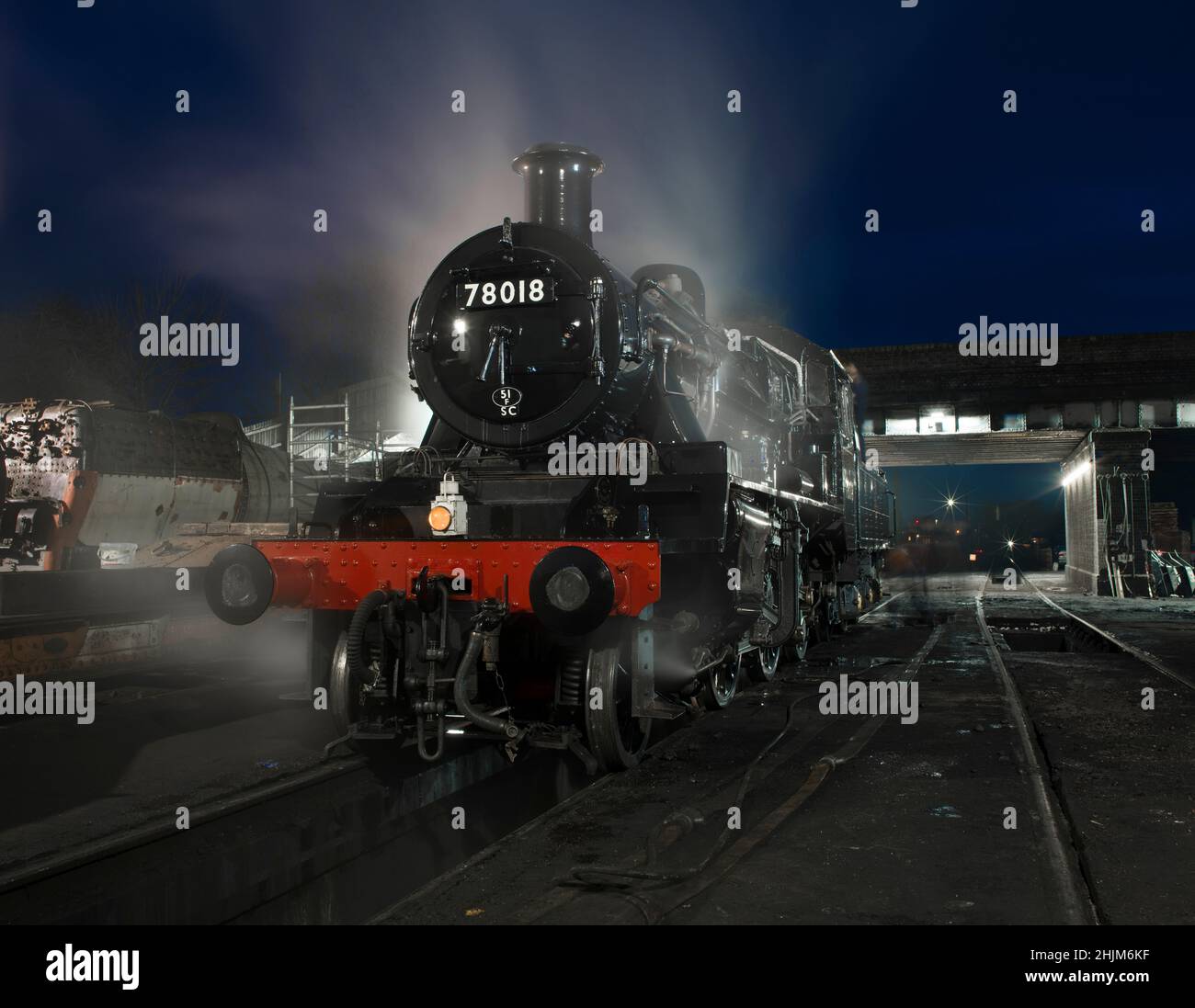 Great Central Railway, Loughborough, Leicestershire, UK, January 28th 2022, British Railways Standard 2 78018 at night in the yard Stock Photo