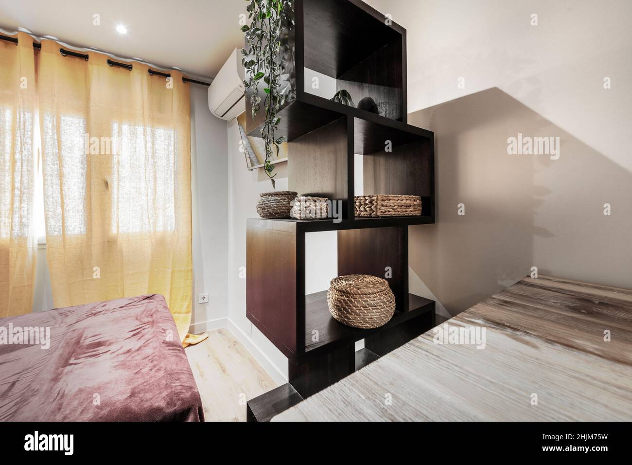 Dark wood shelf with squares and hanging plant Stock Photo Alamy
