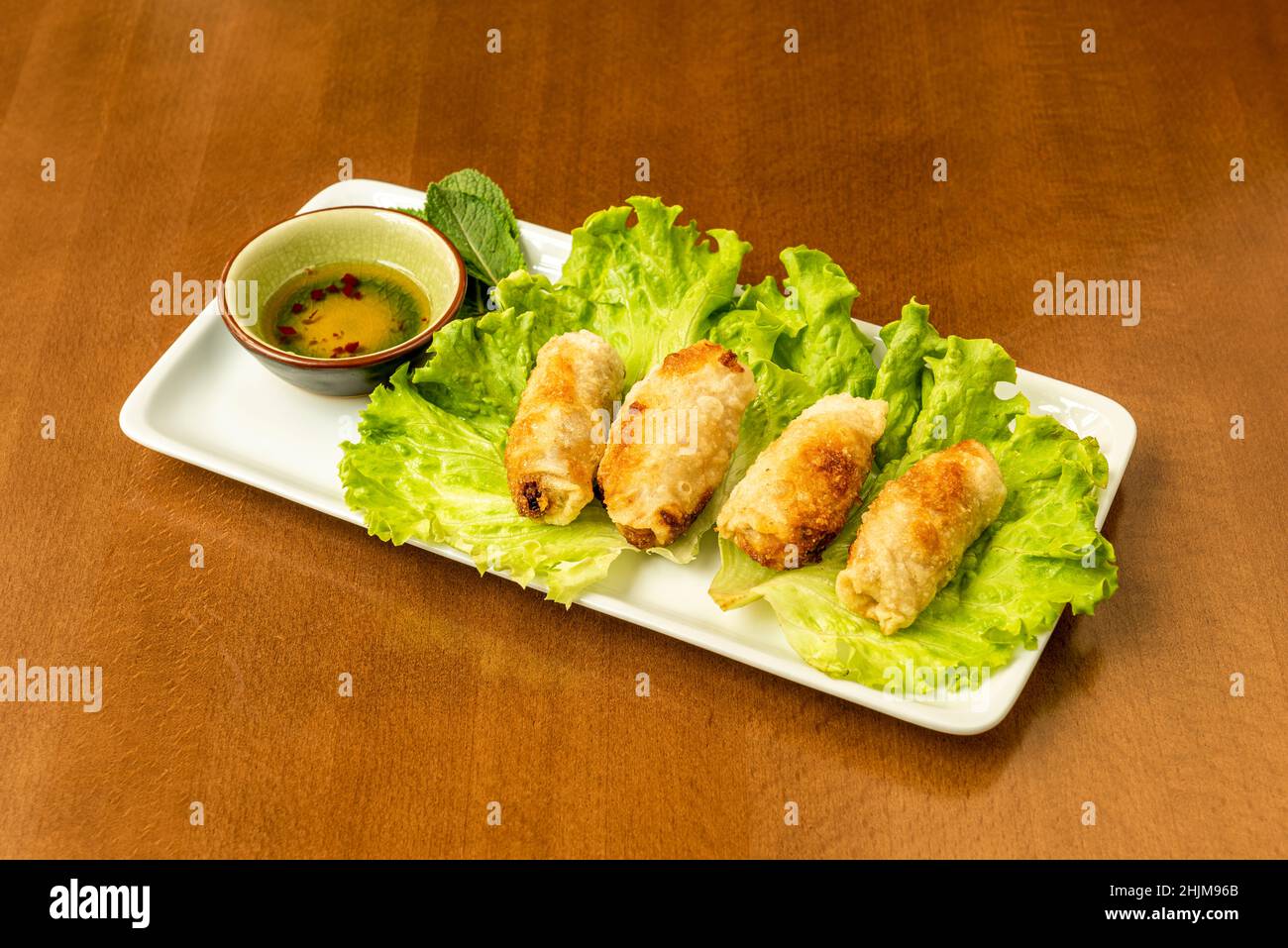 nem rán, is a popular dish in Vietnamese cuisine that is often served as an appetizer in Europe and North America, where there is a large Vietnamese d Stock Photo