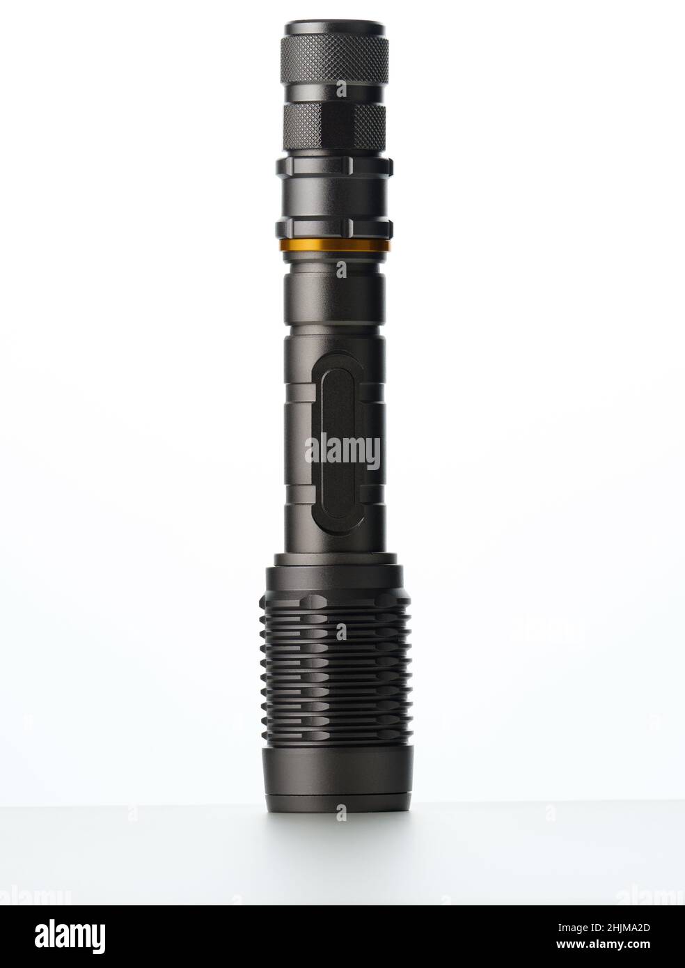 black metal portable flashlight isolated on white background Stock Photo