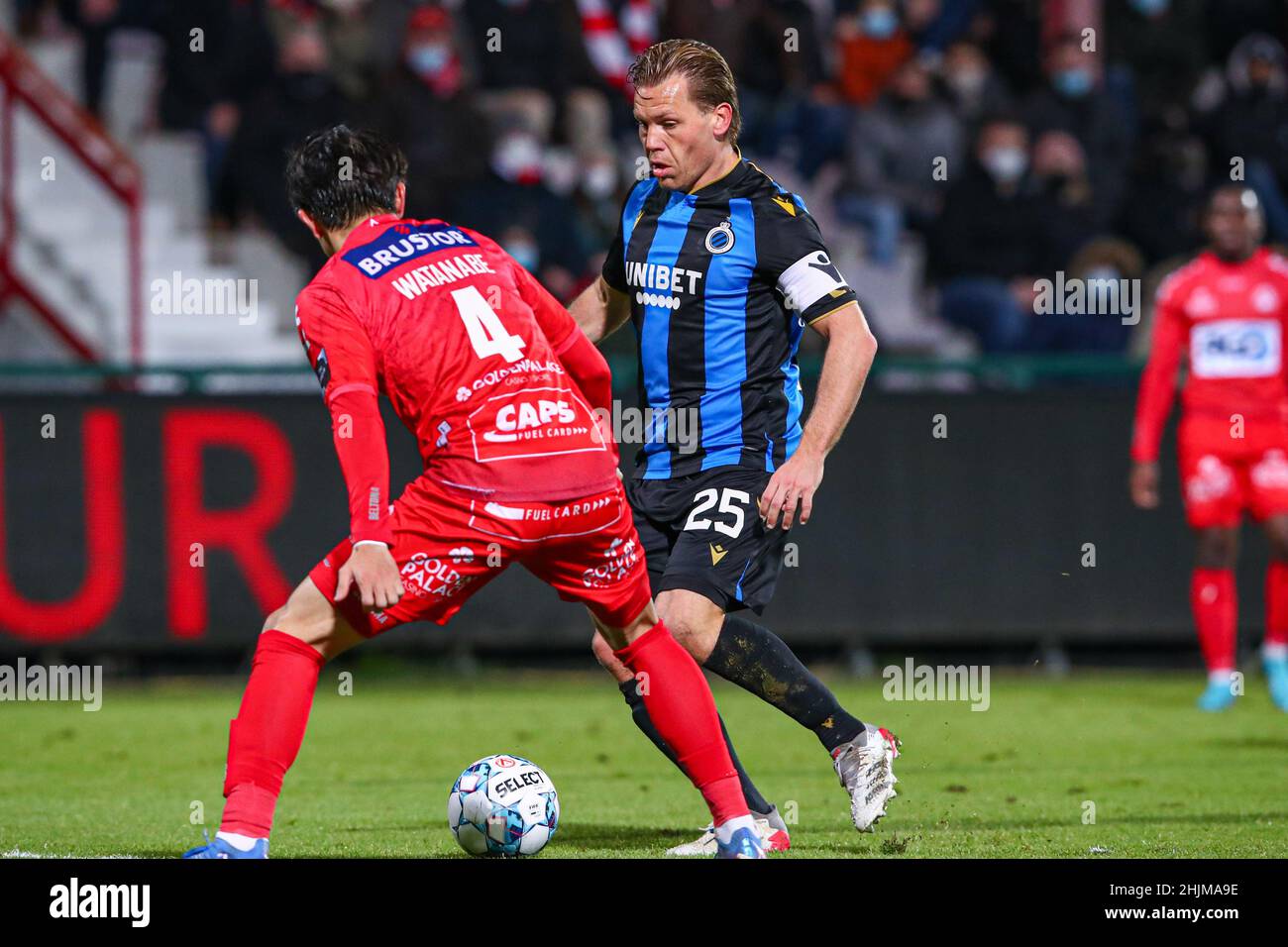 KORTRIJK, BELGIUM - JANUARY 30: Tsuyoshi Watanabe of KV Kortrijk, Ruud  Vormer of Club Brugge KV during the Jupiler Pro League match between KV  Kortrijk and Club Brugge at Guldensporenstadion on January