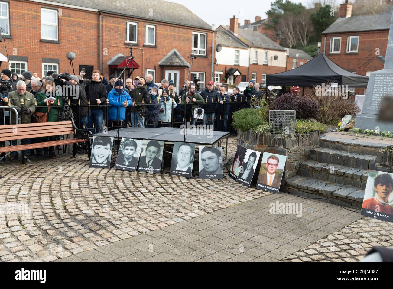 Derry, UK. 30th Jan, 2022. Central Drive, Derry, Family members of those who lost loved ones on Bloody Sunday(30th January 1972) gathered to walk the route in an act of remembrance. At the Bloddy Sunday Memorial, Wreaths were laid by Family and Politicians from the North and South of Ireland. Credit: Bonzo/Alamy Live News Stock Photo