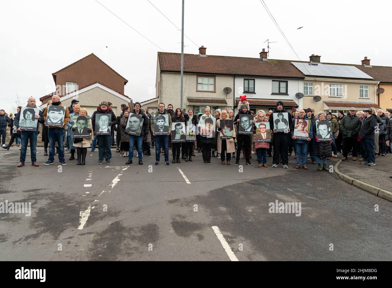 Derry, UK. 30th Jan, 2022. Central Drive, Derry, Family members of those who lost loved ones on Bloody Sunday(30th January 1972) gathered to walk the route in an act of remembrance. At the Bloddy Sunday Memorial, Wreaths were laid by Family and Politicians from the North and South of Ireland. Credit: Bonzo/Alamy Live News Stock Photo