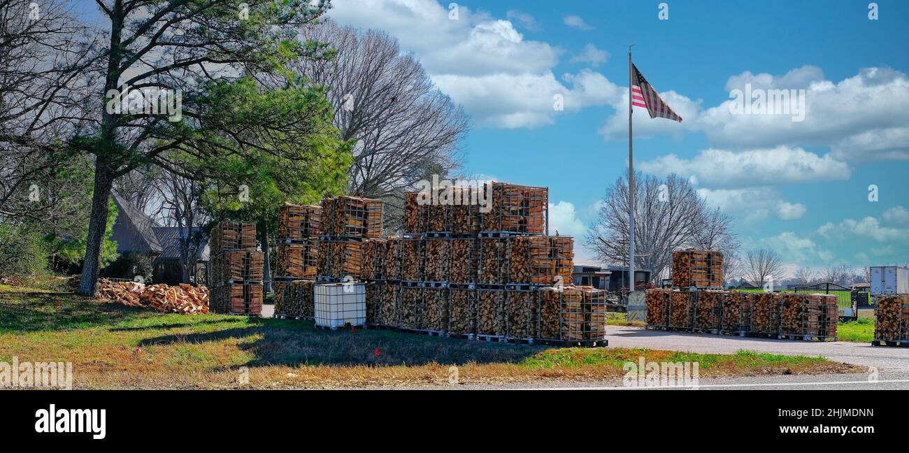 Fire Wood for Sale with American Flag Stock Photo