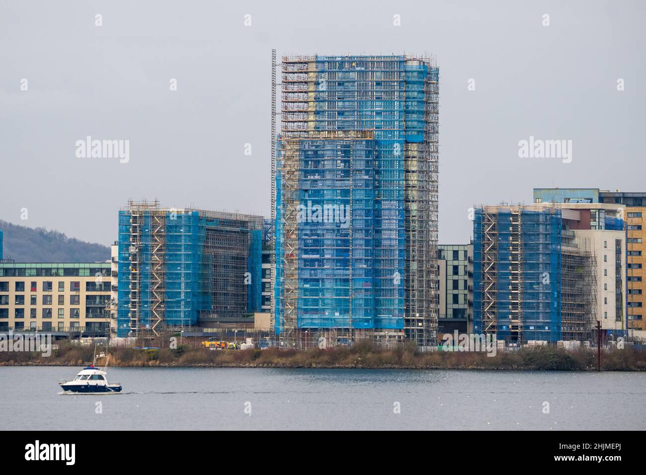 Buildings covered in scaffolding as cladding is removed at Prospect Place, Cardiff Bay in Cardiff, Wales, United Kingdom. Stock Photo