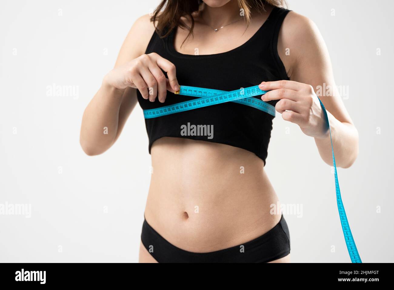 The Girl Taking Measurements Of Her Body White Background Stock Photo -  Download Image Now - iStock