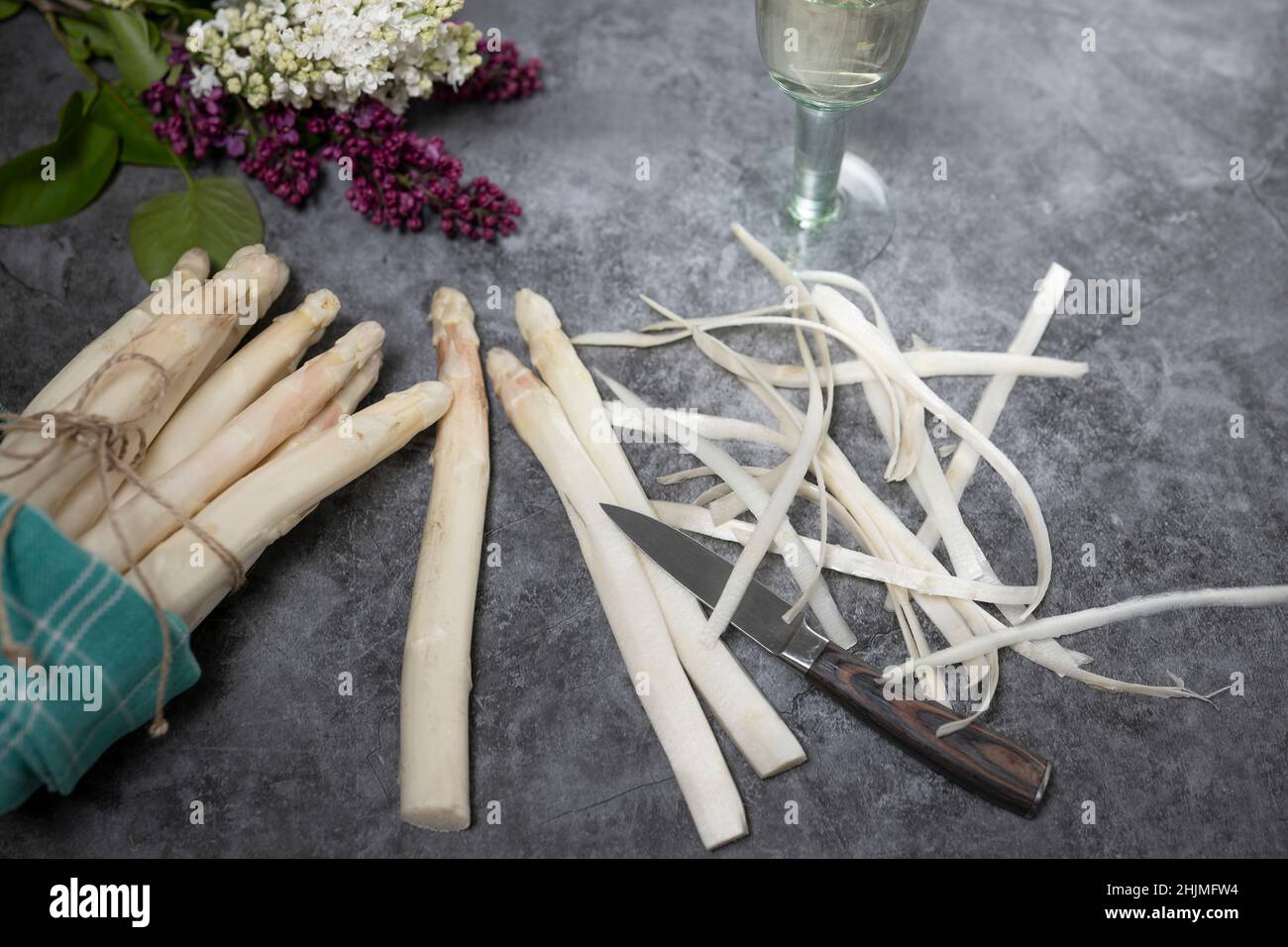 White asparagus is peeled with a knife  Stock Photo