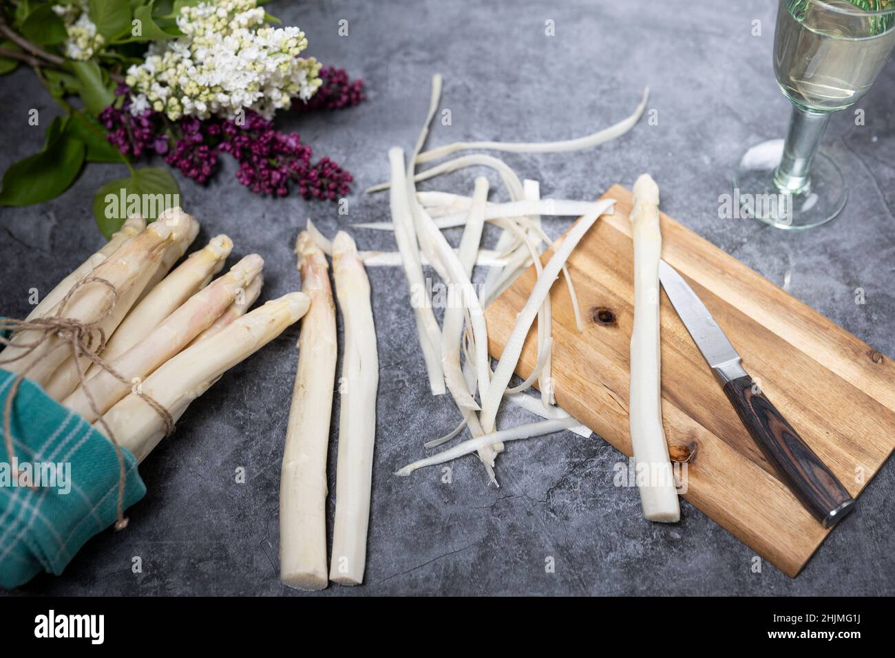 Bunch of fresh white asparagus on a stone table Stock Photo