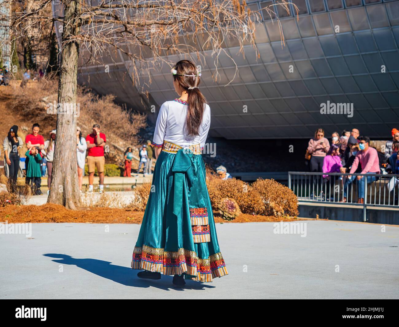 Oklahoma, JAN 29 2022 - Sunny view of the Chinese women group dancing in Lunar New Year Festival Stock Photo