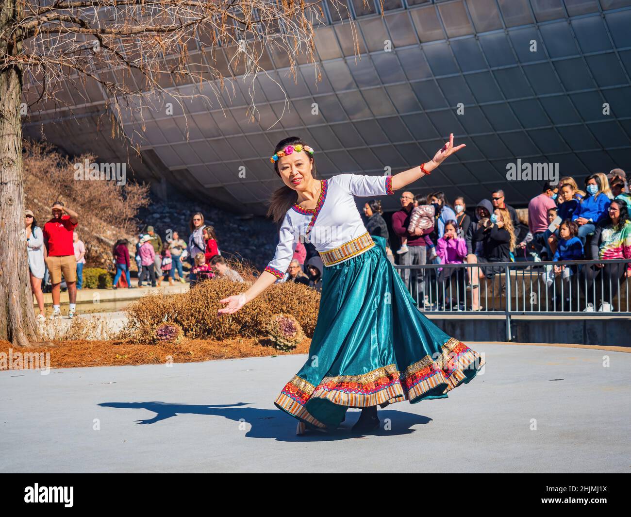 Oklahoma, JAN 29 2022 - Sunny view of the Chinese women group dancing in Lunar New Year Festival Stock Photo