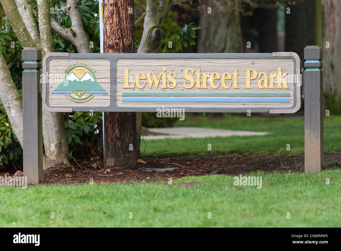 Monroe, WA, USA - January 27, 2022; Wooden sign for Lewis Street Park in the Snohomish County city of Monroe Washington Stock Photo