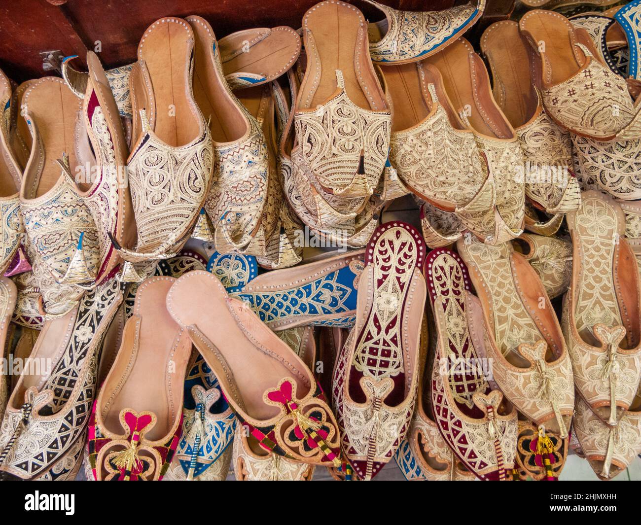 Colourful Arabianstyle shoes on display at Dubai Textile Souk in the