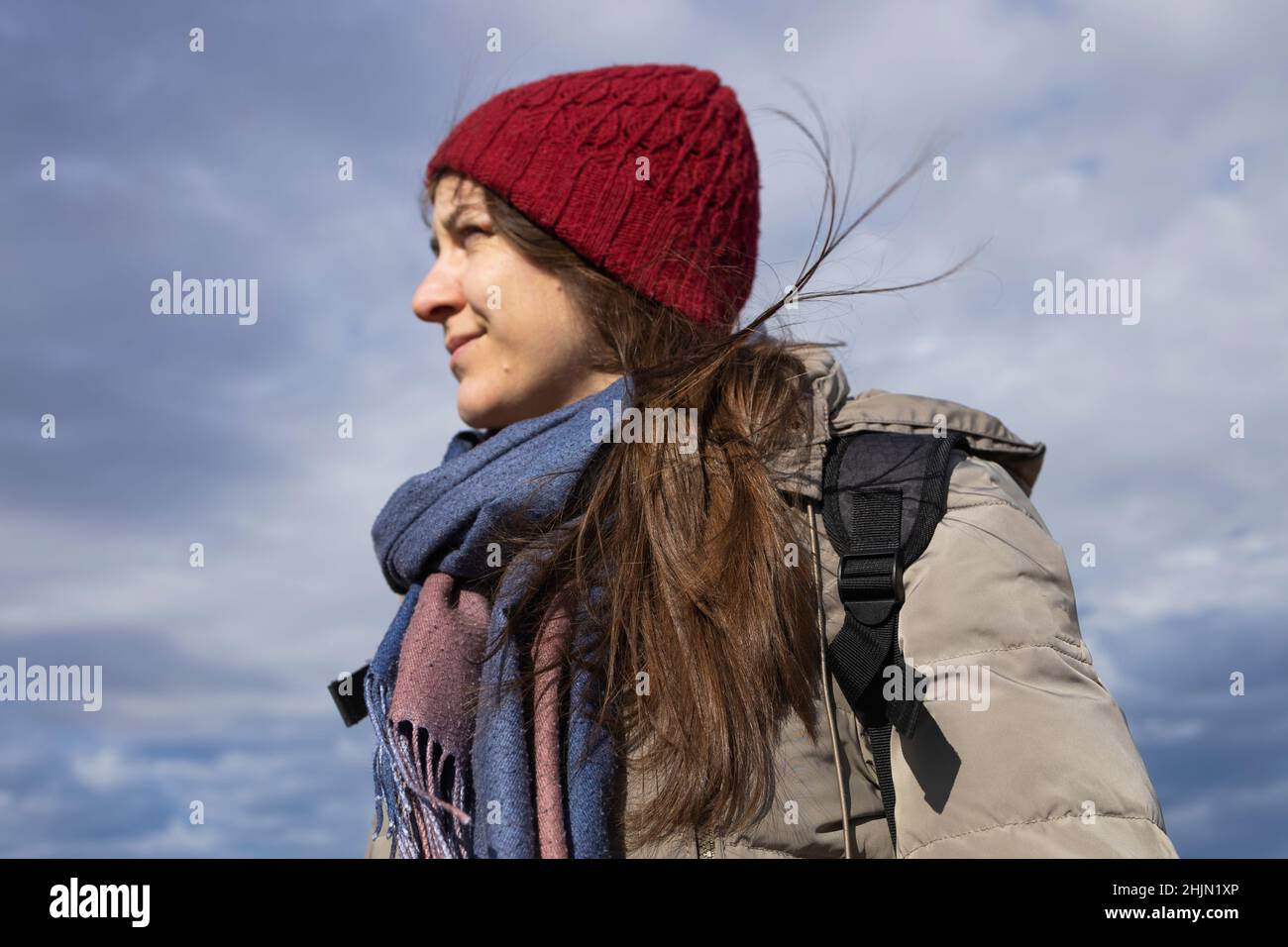 A woman with beautiful natural hair standing in the wind Stock Photo