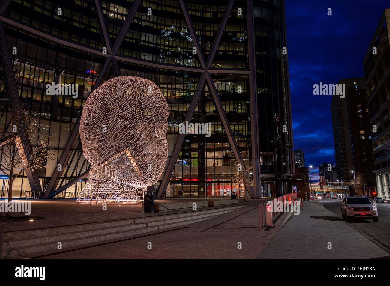 Calgary, Alberta - January 30, 2022: View of the Wonderland sculpture outside the Bow Tower in Calgary. Stock Photo