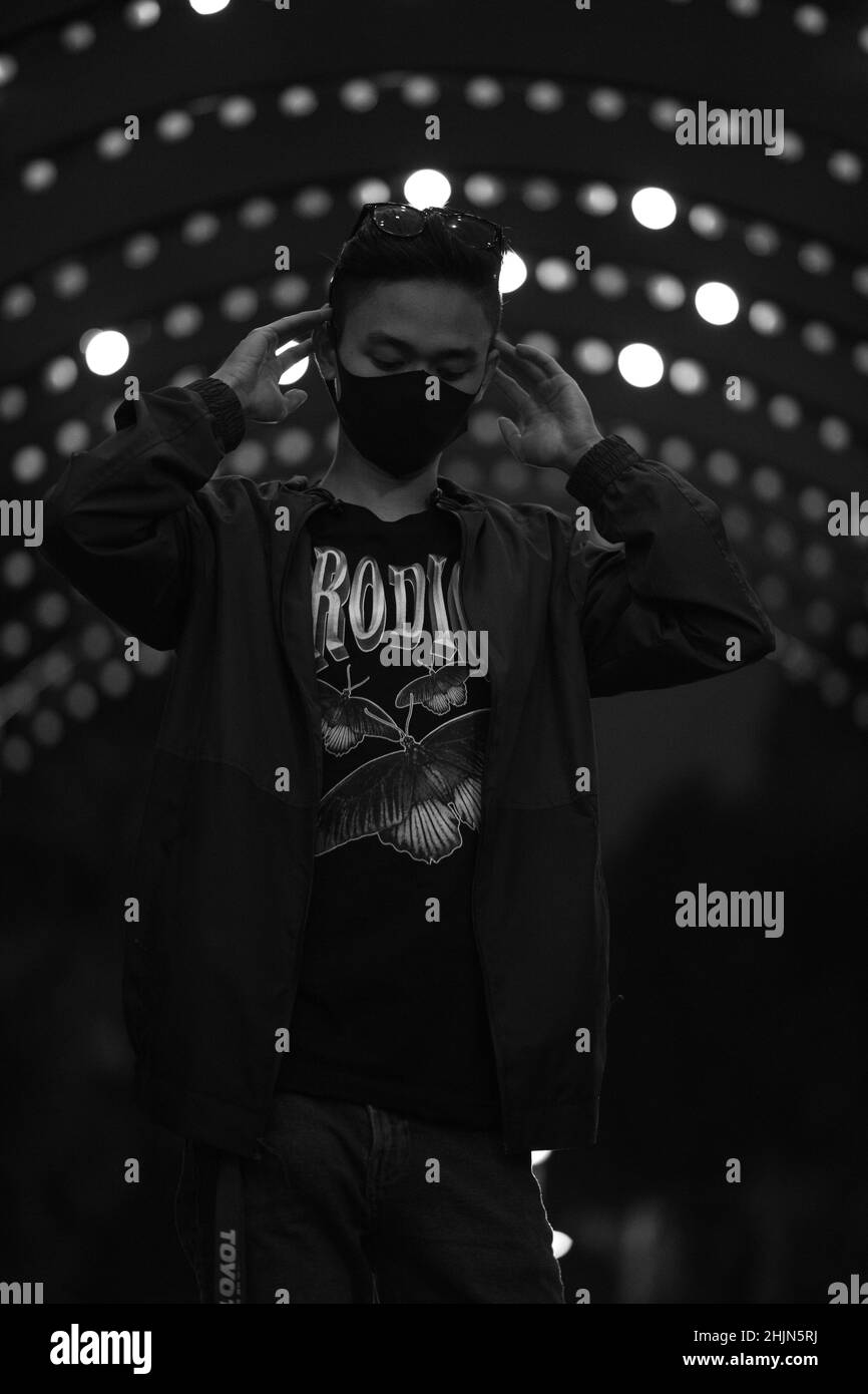 Portrait of a boy wearing a mask in a studio Stock Photo - Alamy