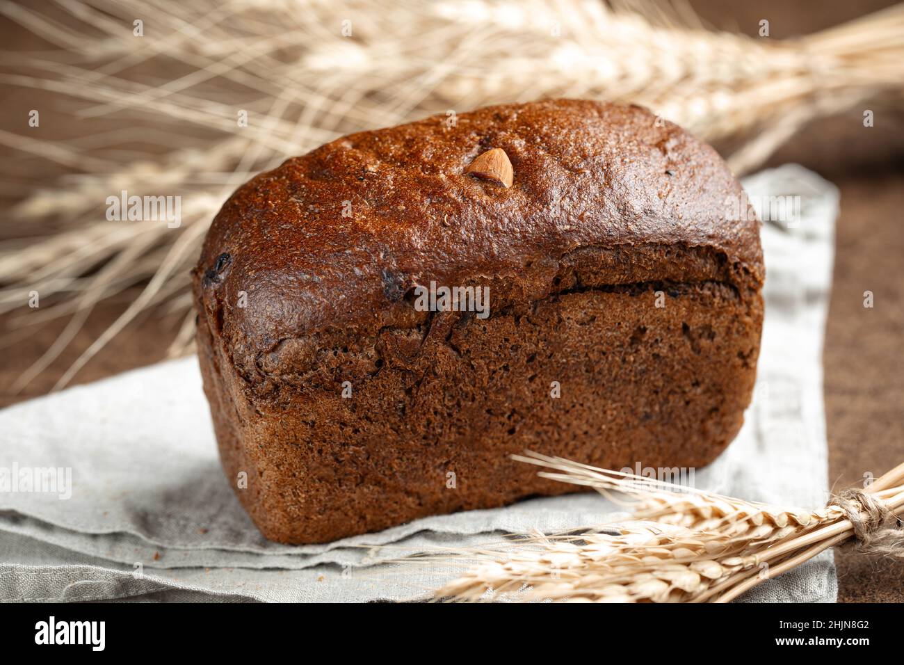 Fresh baked rye bread with dried fruits and nuts Stock Photo Alamy