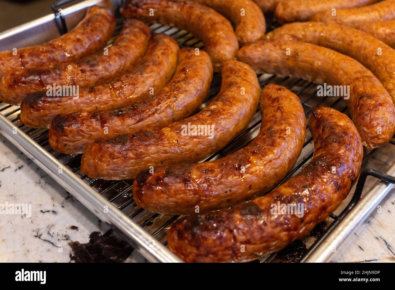 delicious cooked grilled sausage food close up shot Stock Photo