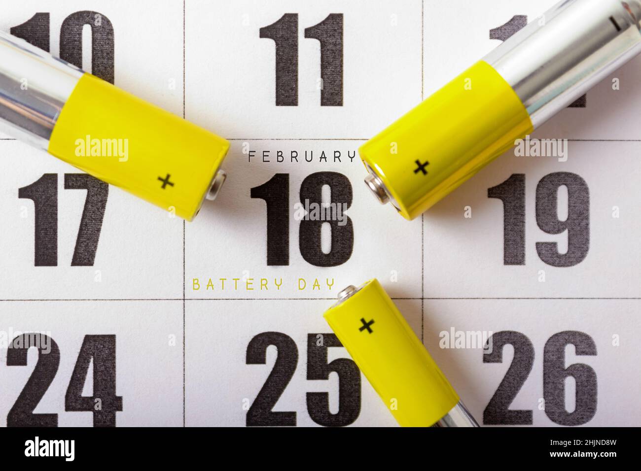 National battery day. Calendar, batteries, text Stock Photo Alamy