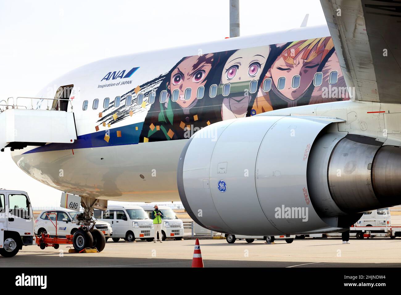 Tokyo, Japan. 30th Jan, 2022. Japanese largest air carrier All Nippon Airways' (ANA) B-767 jet designed with characters of mega hit comics and animation series 'Demon Slayer' is displayed at Tokyo's Haneda airport for a chartered flight on Sunday, January 30, 2022. ANA will start commercial flights of 'Demon Slayer' jet on domestic routes from January 31. Credit: Yoshio Tsunoda/AFLO/Alamy Live News Stock Photo