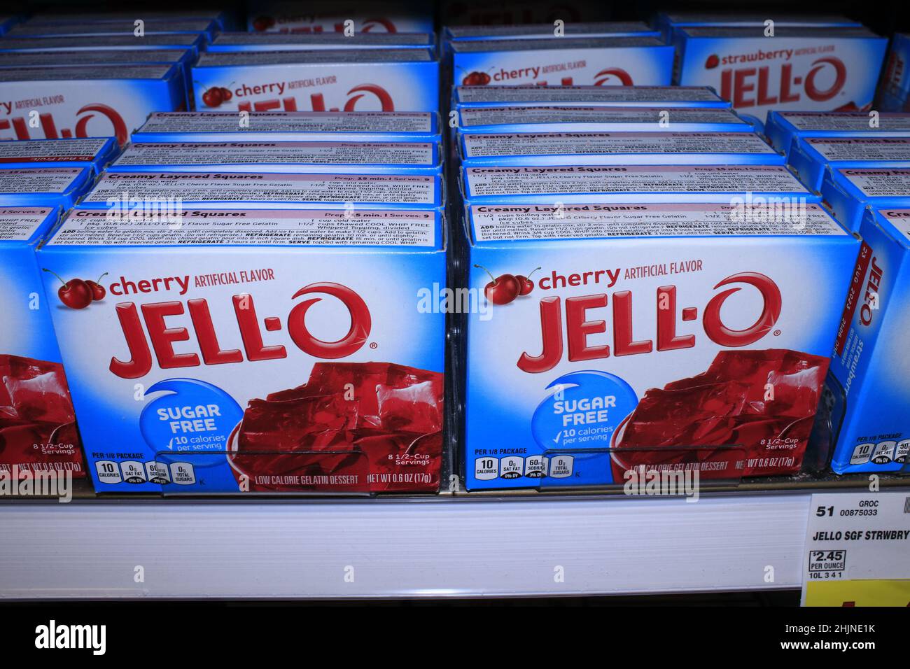 A closeup of Cherry JELL-O sugar free JELL-O on a metal shelf Stock Photo