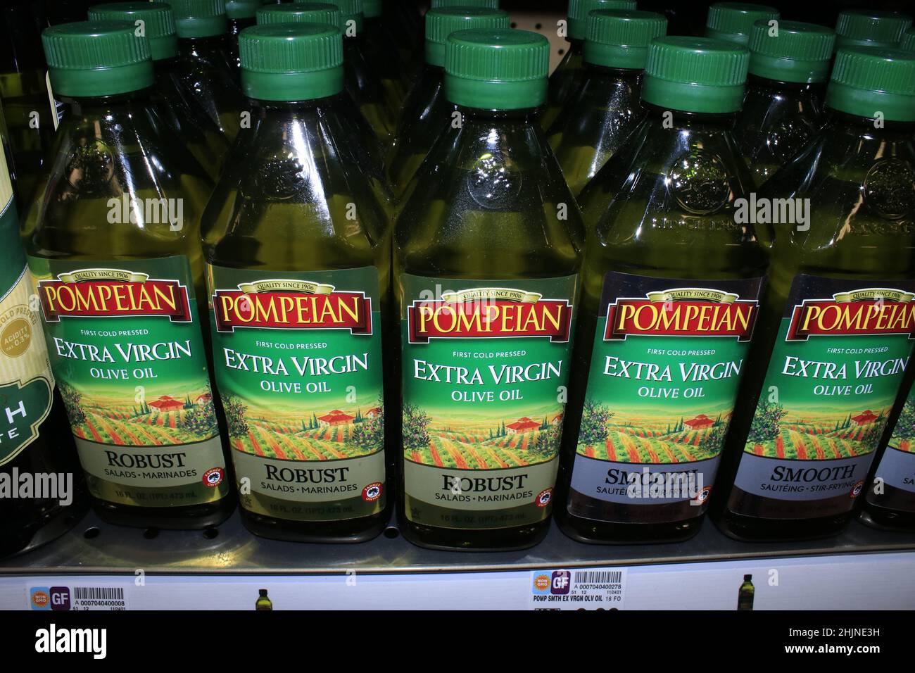 A closeup of POMPELAN Olive oil on a metal shelf at a Dillons grocery store Stock Photo