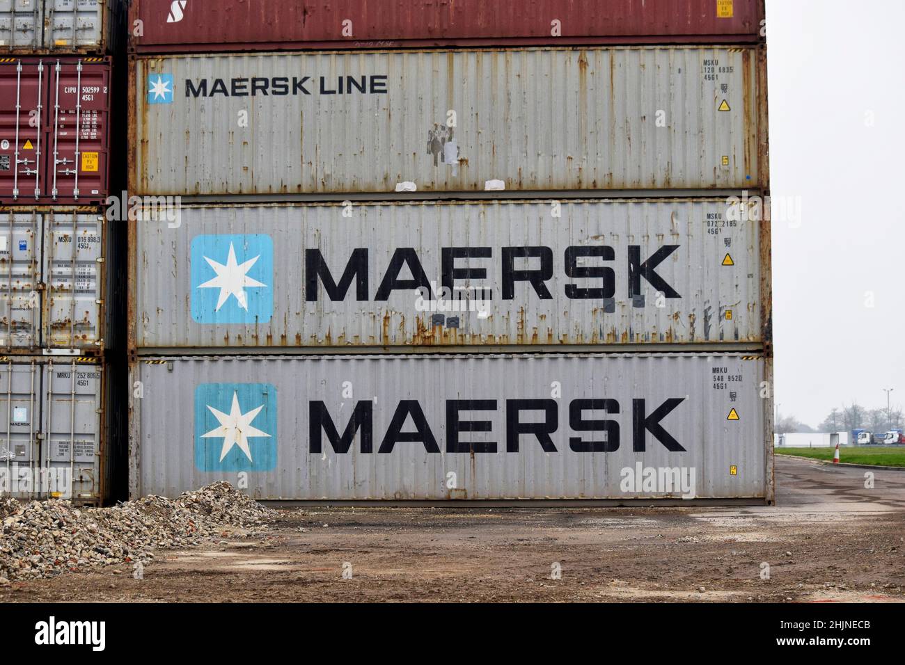 1000 empty shipping containers stacked at eye airfield trading estate
