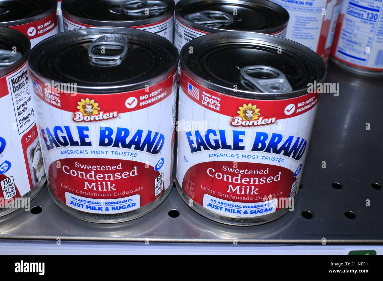 A closeup of Borden EAGLE BRAND Sweetened Condensed Milk on a metal