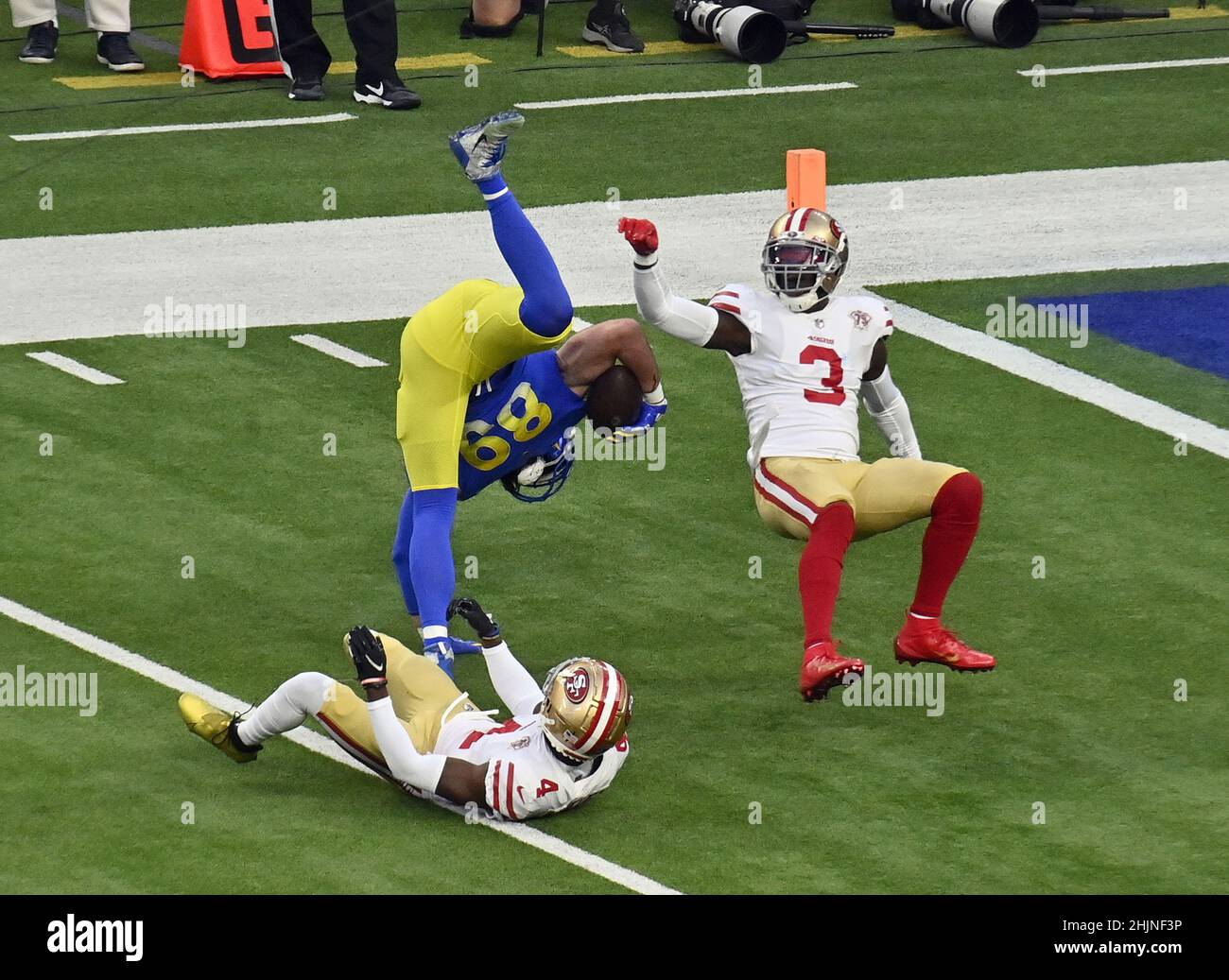 Inglewood, United States. 31st Jan, 2022. Los Angeles Rams' Tyler Higbee (89) is upended by San Francisco 49ers Emmanuel Moseley (4) during the first quarter in the NFC Championship game at SoFi Stadium in Inglewood, California on Sunday, January 30, 2022. Photo by Jim Ruymen/UPI Credit: UPI/Alamy Live News Stock Photo