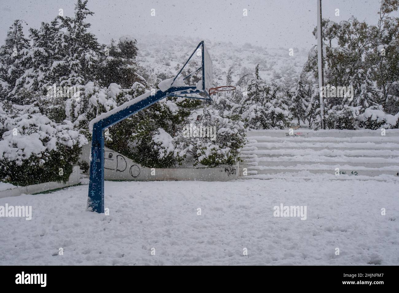 A basketball court full of snow during "Elpis" snowstorm at Athens