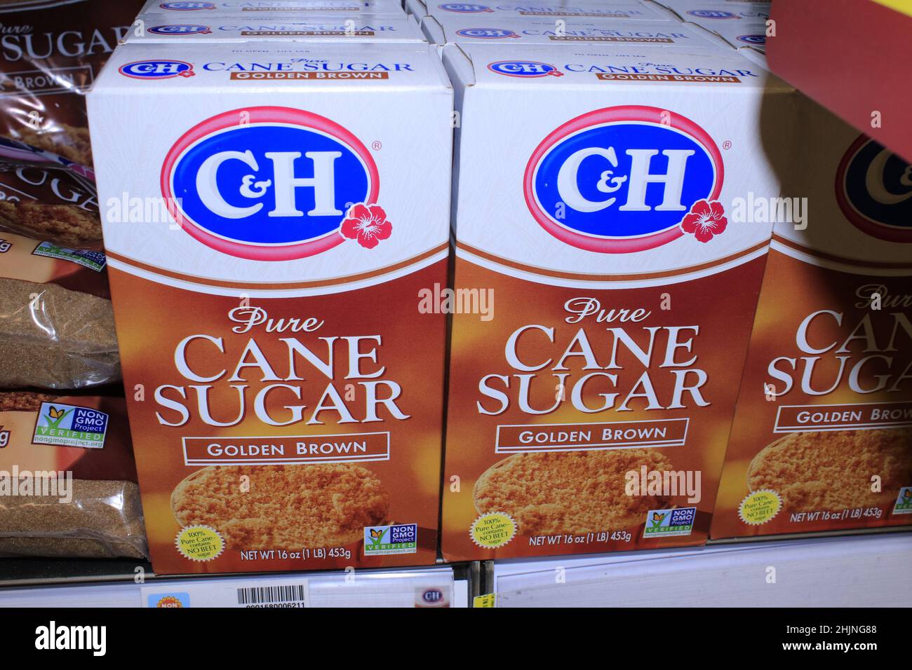 A closeup of C&H Pure CANE SUGAR GOLDEN BROWN on a metal shelf in a Dillons store in Kansas Stock Photo