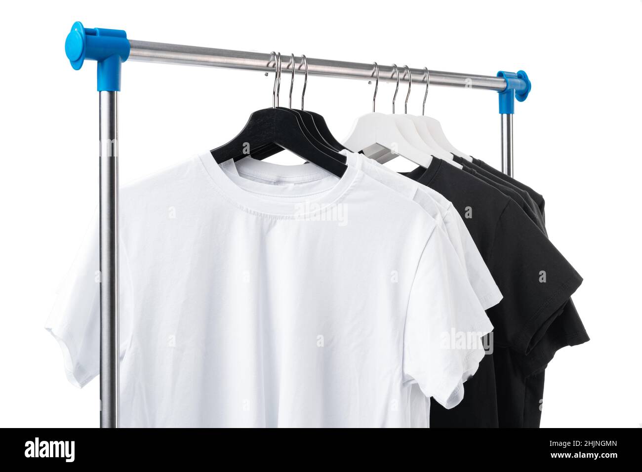 Black and white T-shirts on hangers on metal rack isolated on white Stock  Photo - Alamy