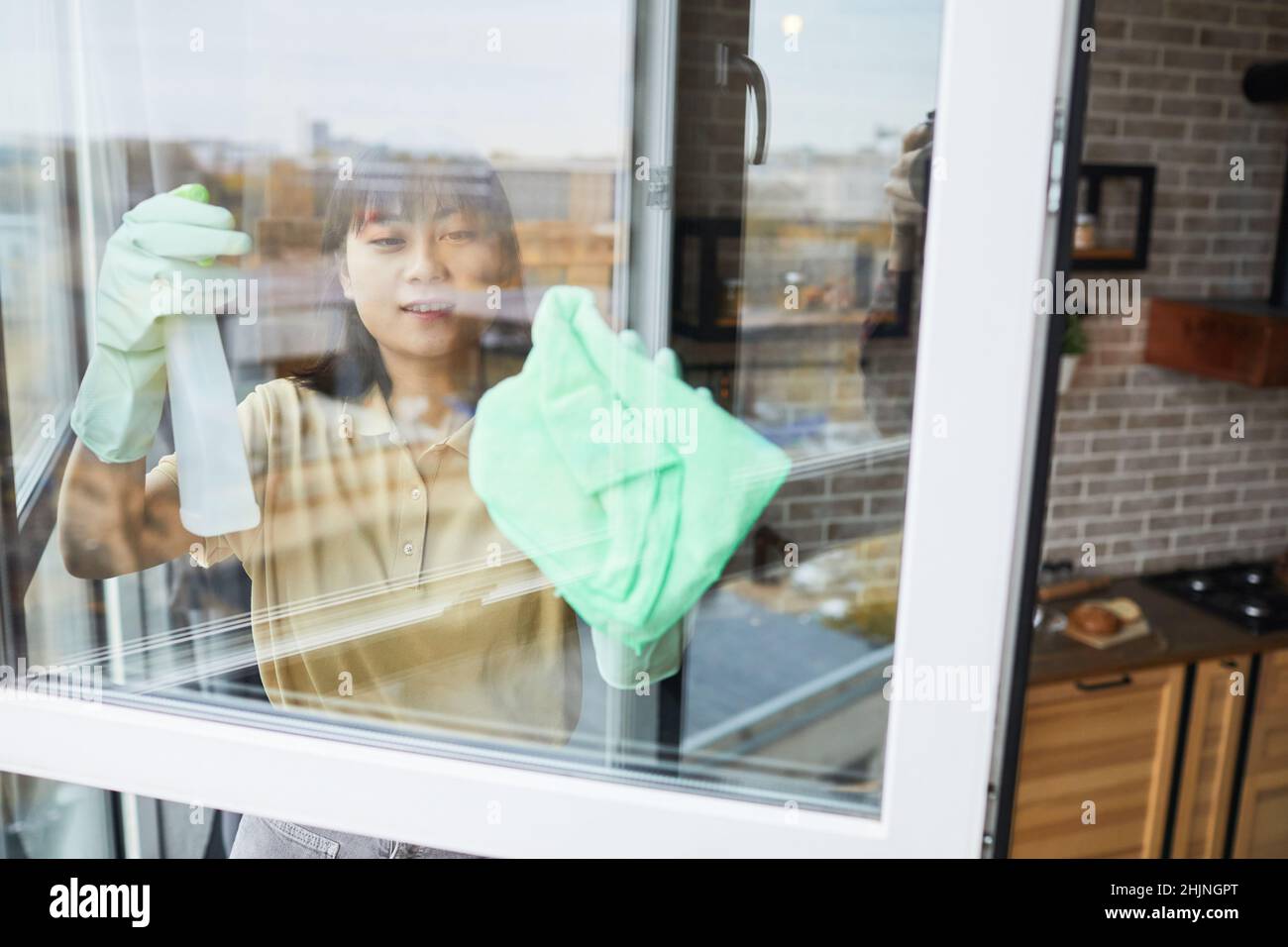 Asian house cleaner cleaning hi-res stock photography and images - Alamy