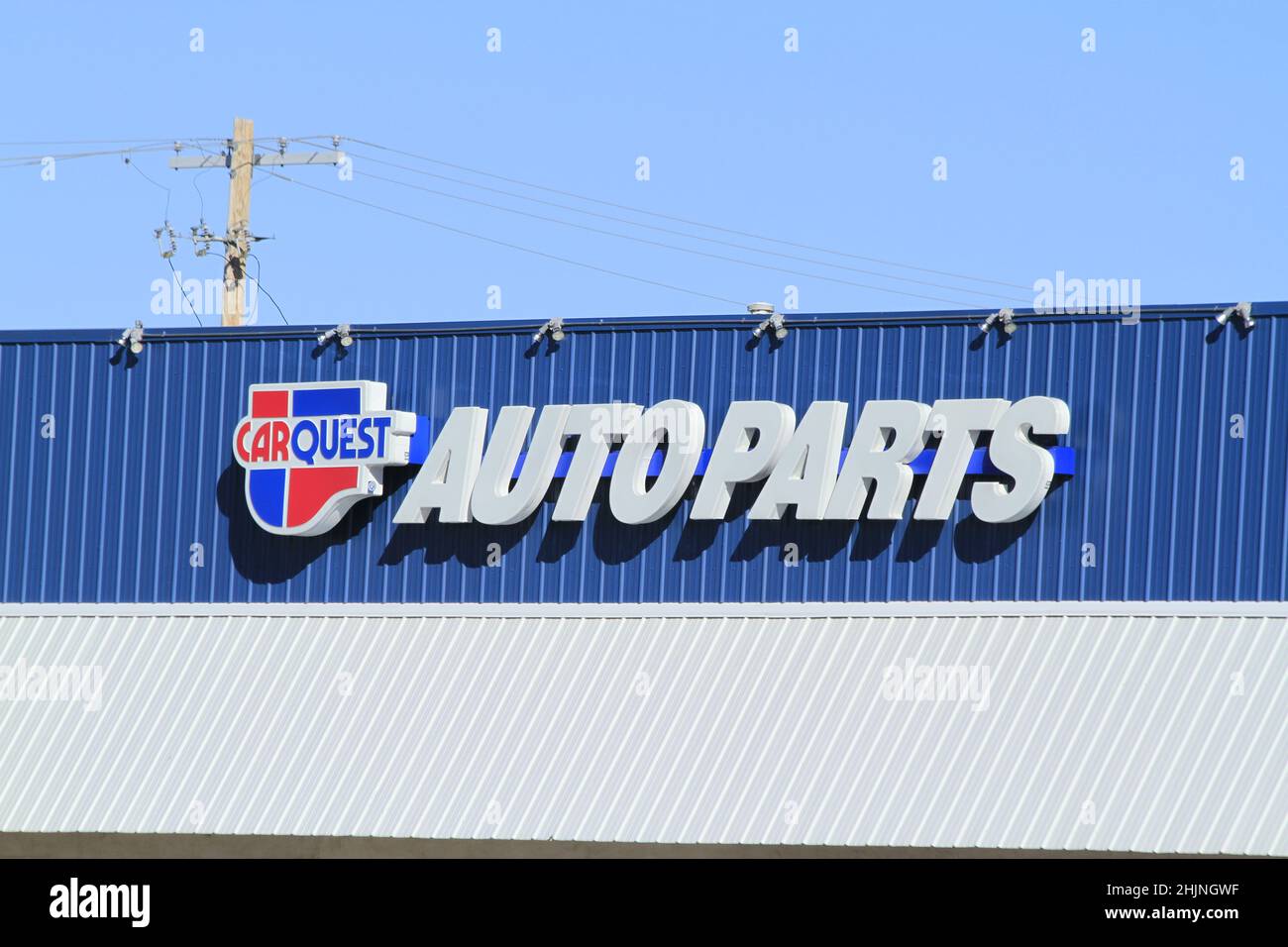 CARQUEST AUTO PARTS Advertisement sign that's bright and colorful on a building in Kansas. Stock Photo