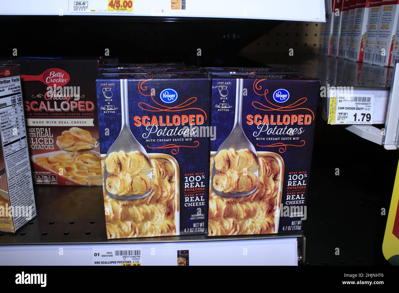 A closeup shot of Kroger Scalloped Potatoes on a metal shelf at a Dillons store in Kansas Stock Photo