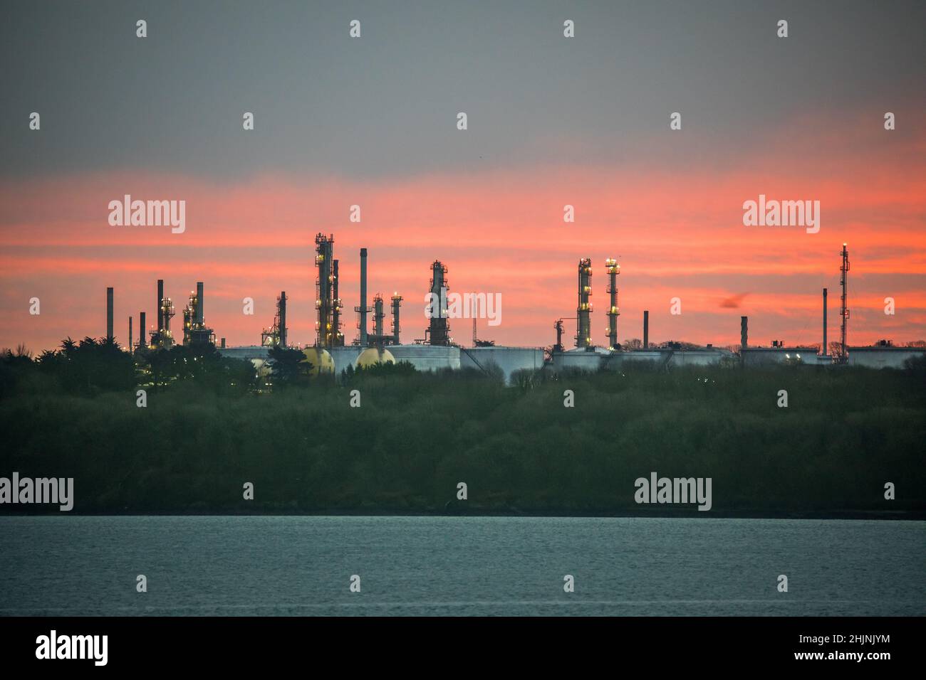 Whitegate, Cork, Ireland. 31st January, 2022. Distillation towers and storage tanks of the oil refiney at dawn in Whitegate, Co. Cork, Ireland. - Credit; David Creedon / Alamy Live News Stock Photo