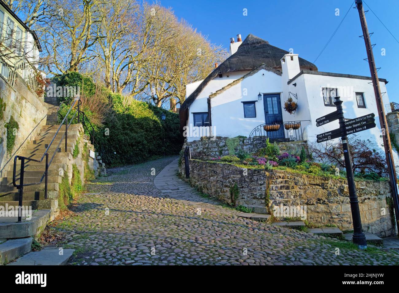 UK, North Yorkshire, Knaresborough, Cottage and Intersection of Water Bag Bank and Waterside Stock Photo