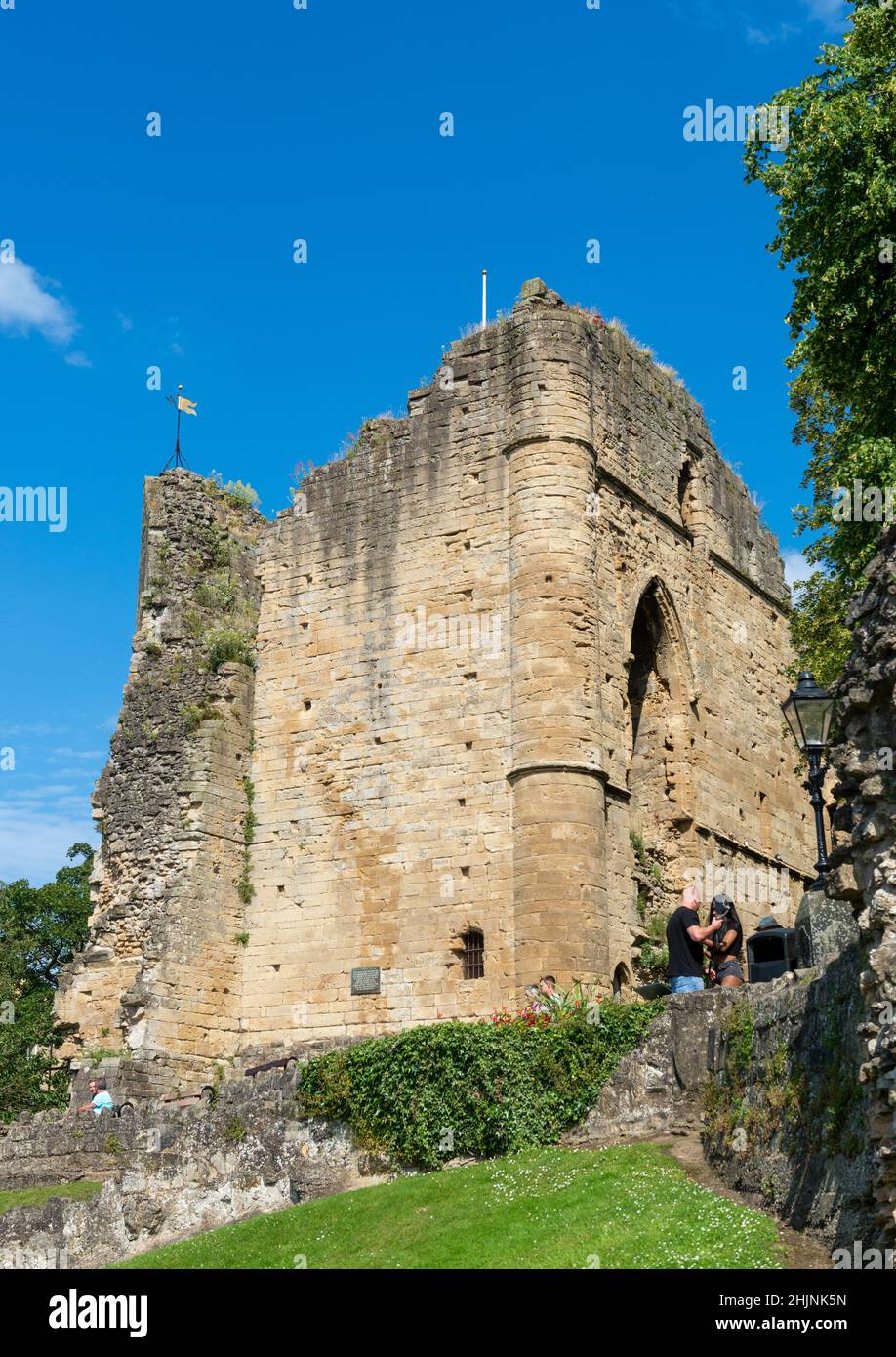 Summer view of the ruined stone keep of Knaresborough Castle, once a medieval fortress, now a popular visitor attraction in this Yorkshire town Stock Photo