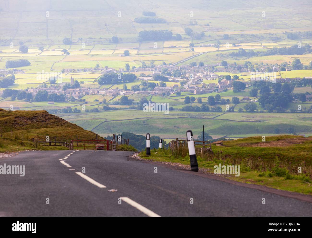 Long distance view from Stags Fell across Wensleydale towards Hawes with the Buttertubs road in the foreground Stock Photo