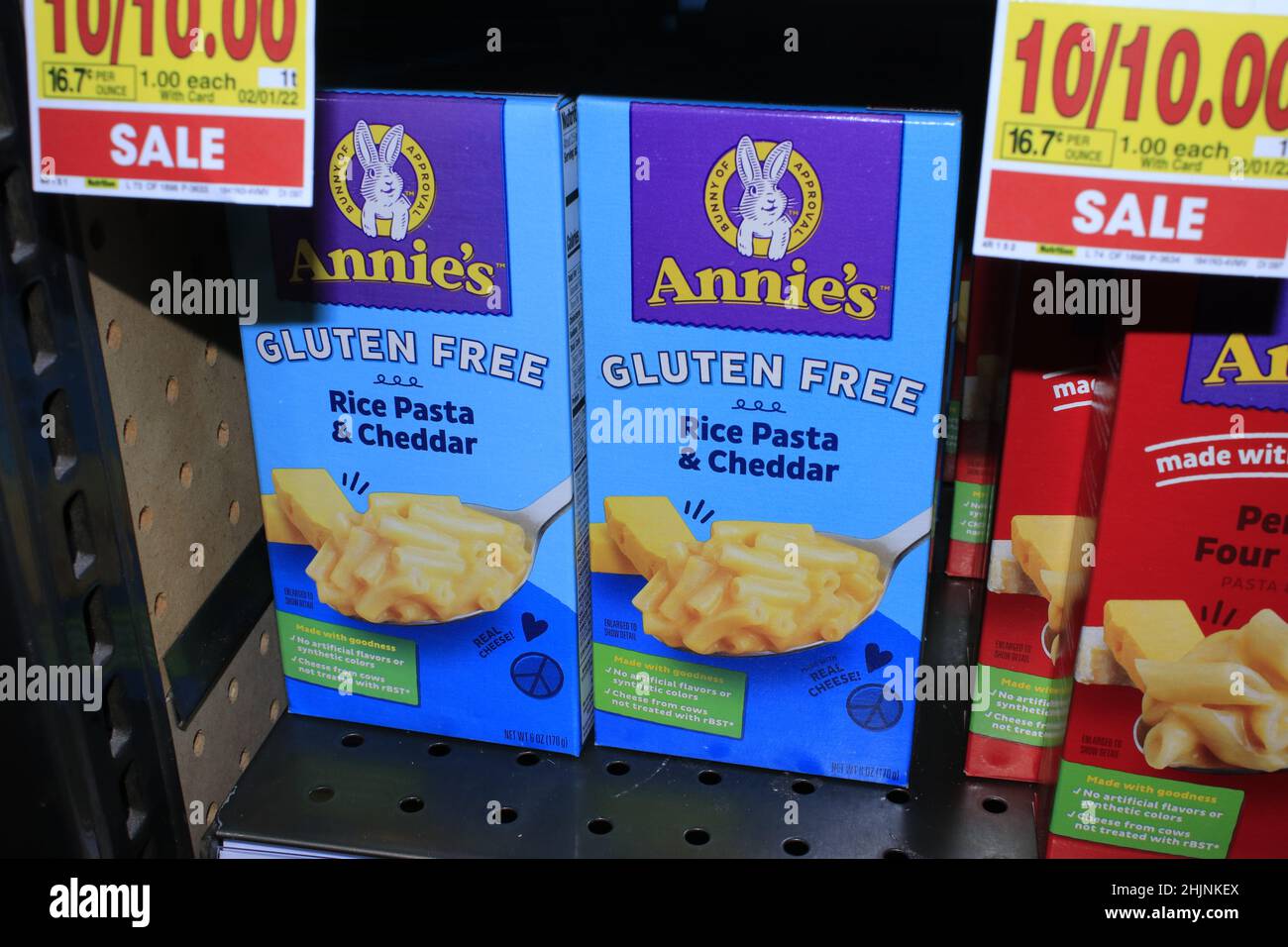 A closeup of ANNIE'S Rice Pasta and Cheddar on a metal shelf in a Dillons store Stock Photo