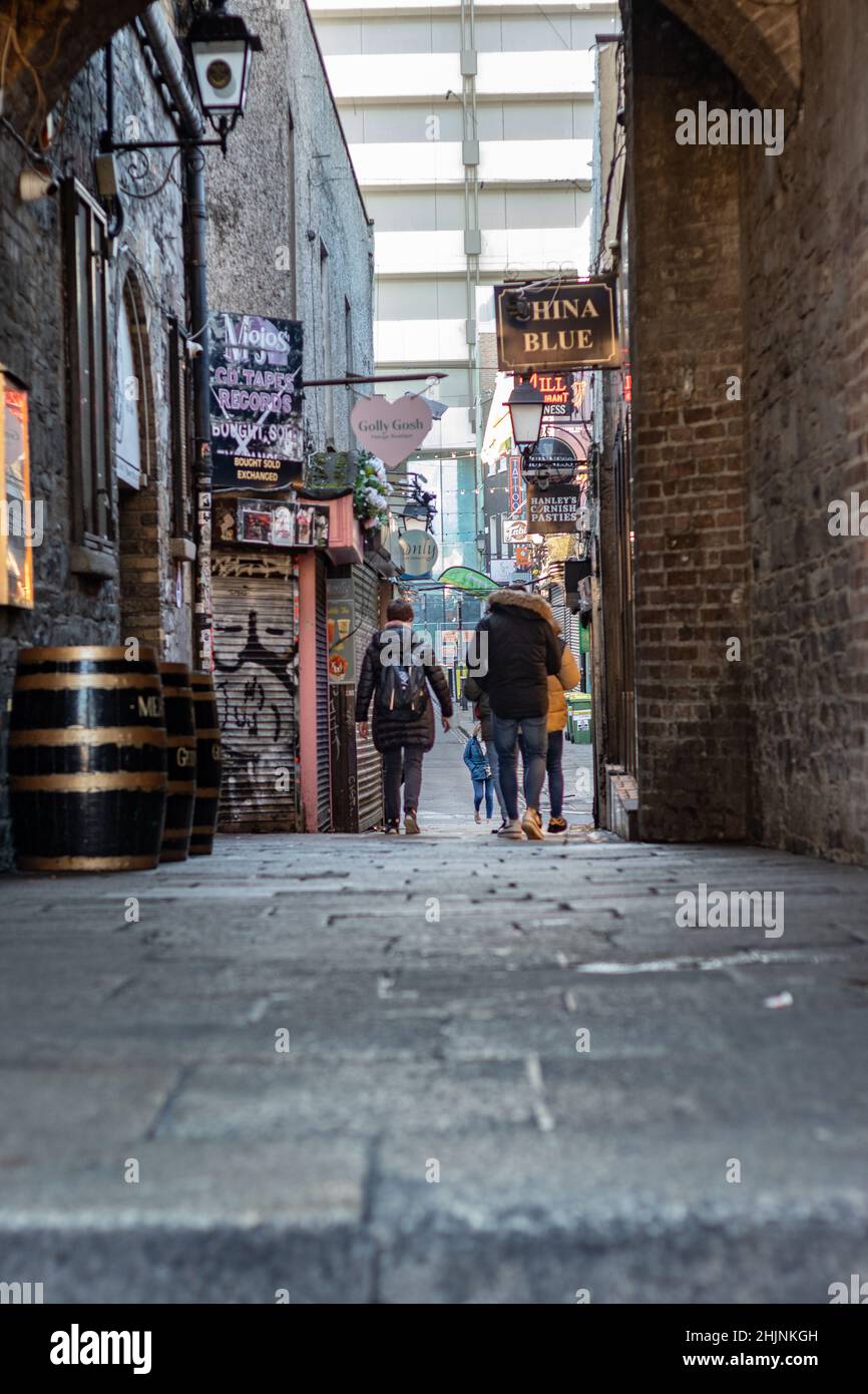 Pedestrians at narrow streets Temple Bar area, Irish famous pubs