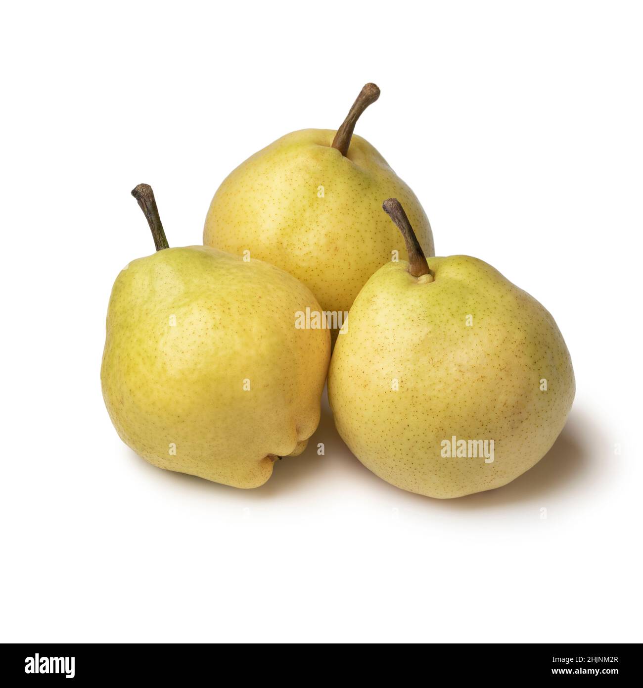 Three fresh ripe tasty Doyenne du Comice pears isolated on white background Stock Photo