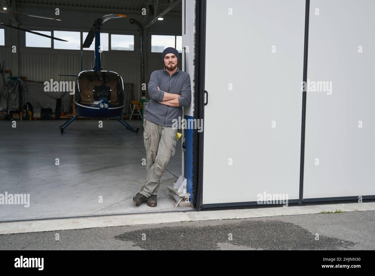 Male mechanic posing isolated in copter background Stock Photo