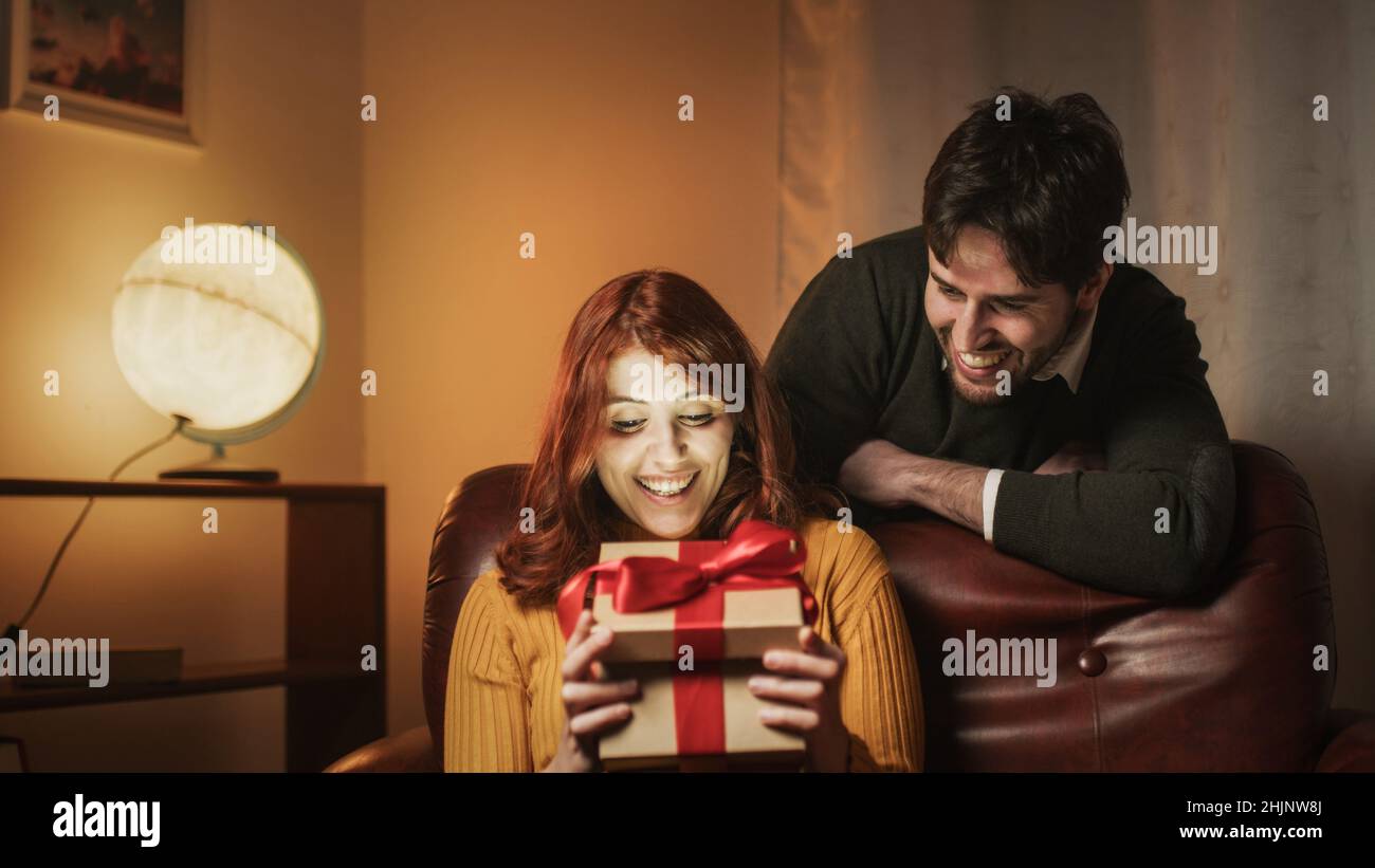 Guy surprise his girlfriend with gift box for valentines day Stock ...