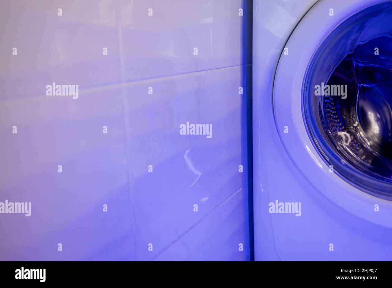 washing machine in the bathroom. maintenance of household appliances