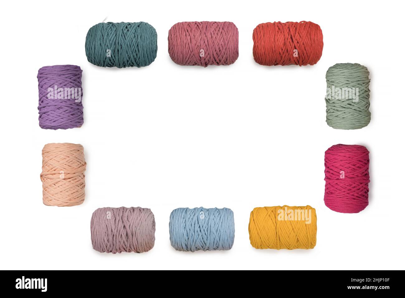 Frame of colorful macrame yarns isolated on white background. Natural