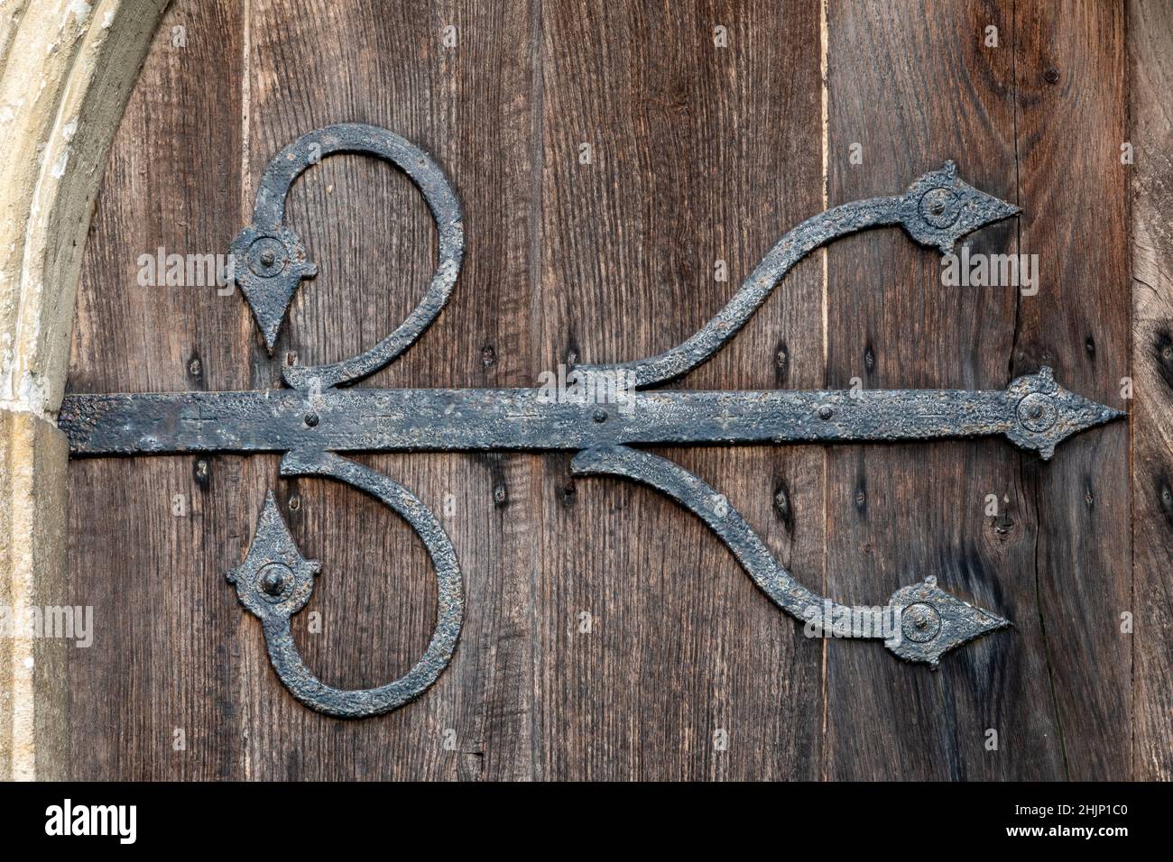 Wrought iron hinge door detail at The Church of St Lawrence, Brundish, Suffolk, UK Stock Photo