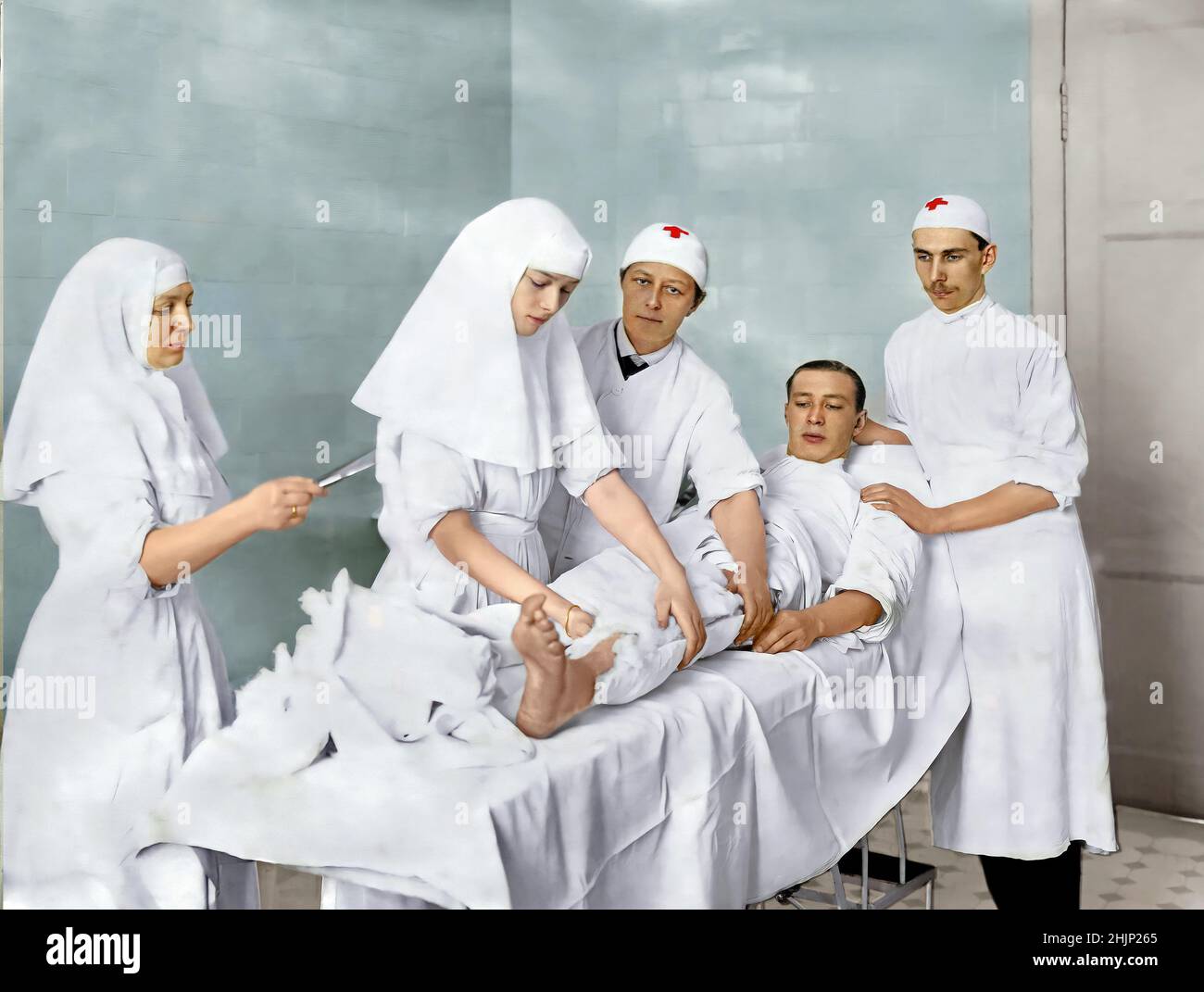 Grand Duchess Tatiana Nikolaevna bandaging Warrant Officer Gruzdev. Tsarskoye Selo hospital. 1916 year. Stock Photo